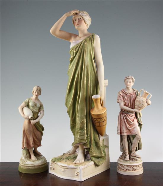 Three Royal Dux coloured biscuit porcelain figures, late 19th / early 20th century, 28.5cm - 52cm, largest figure repaired